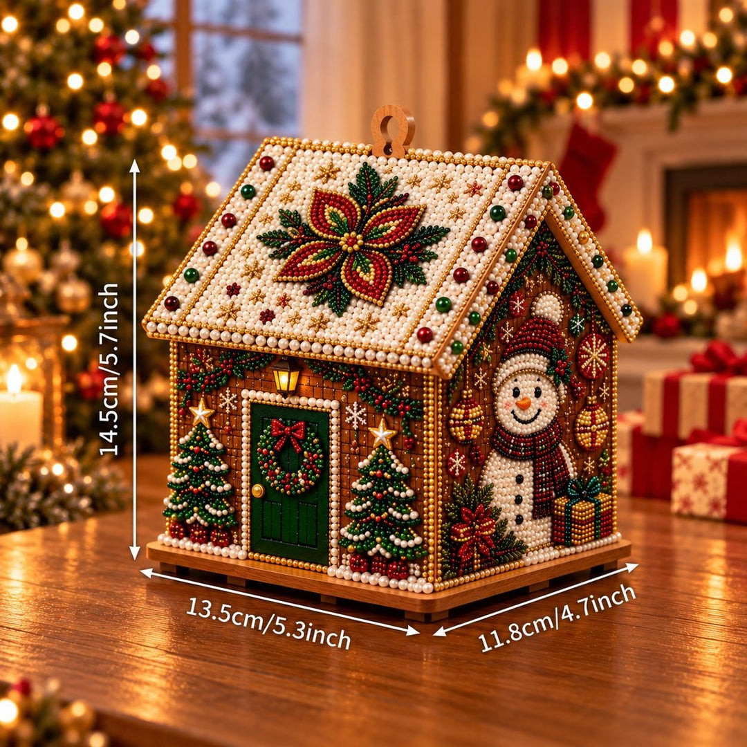 A detailed, intricately designed gingerbread house ornament sits on a wooden surface, surrounded by a festive Christmas tree and other holiday decorations.