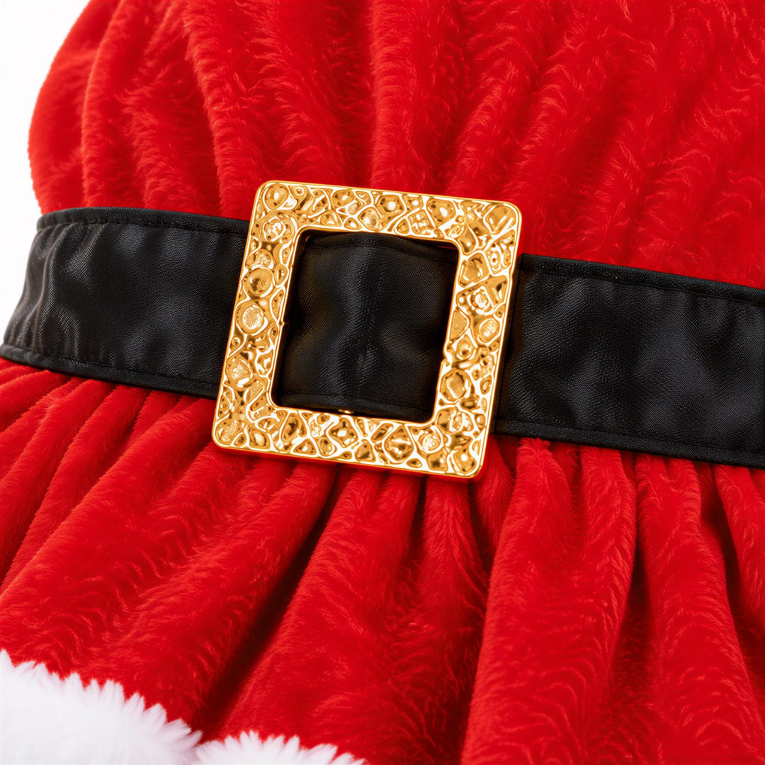 A close-up view of a red fabric with a gold-colored buckle, which appears to be a decorative piece or accessory.