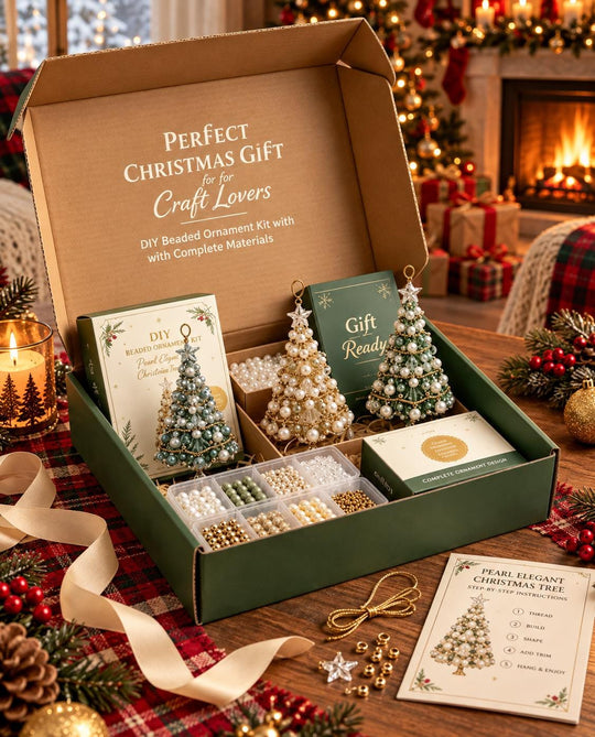 A Christmas-themed gift box containing various DIY beaded ornament kits, with a cozy fireplace and holiday decorations in the background.